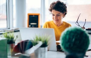 Woman using web-to-print service