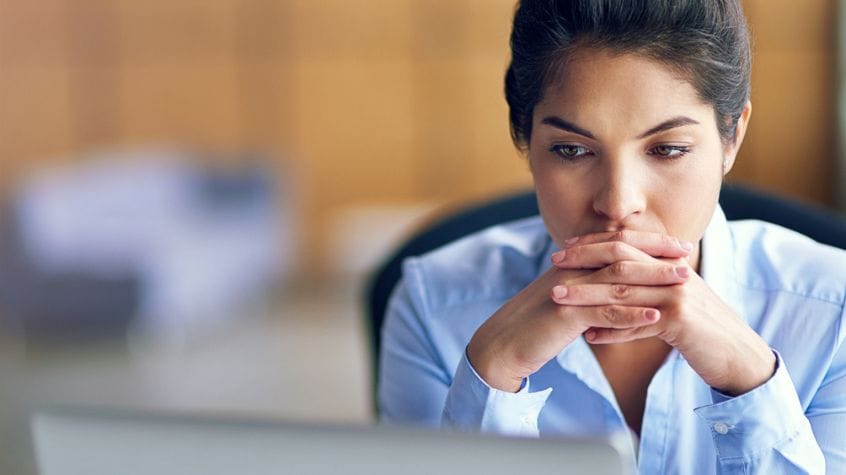 Nonprofit leader reviewing metrics to measure direct mail ROI